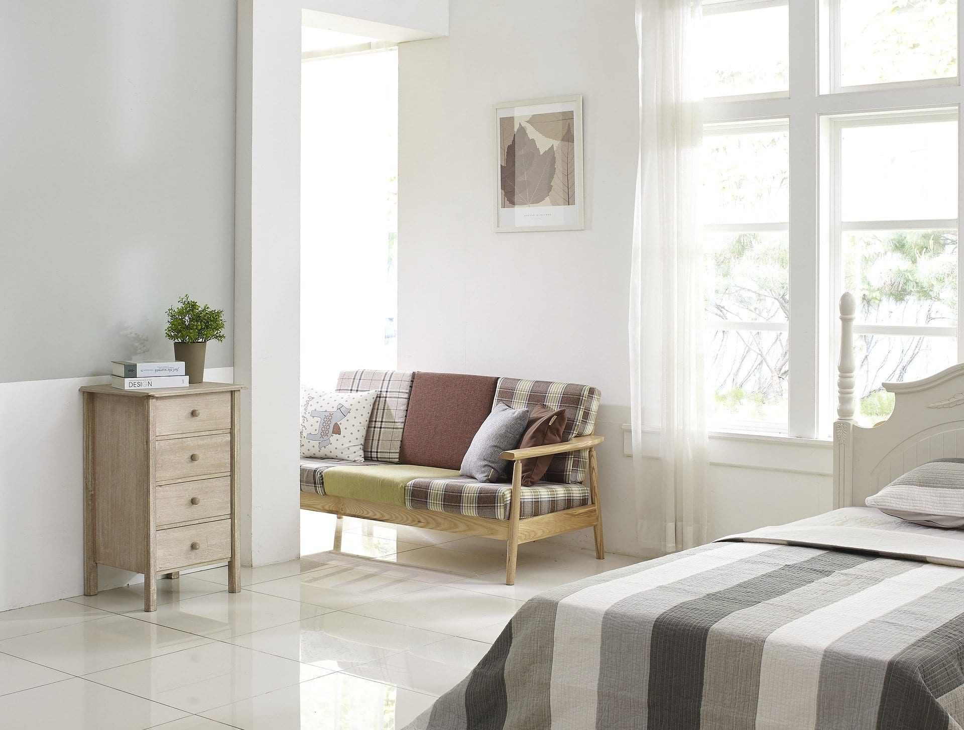 bright white bedroom with large windows