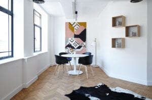 dining room with large print and laminated floor