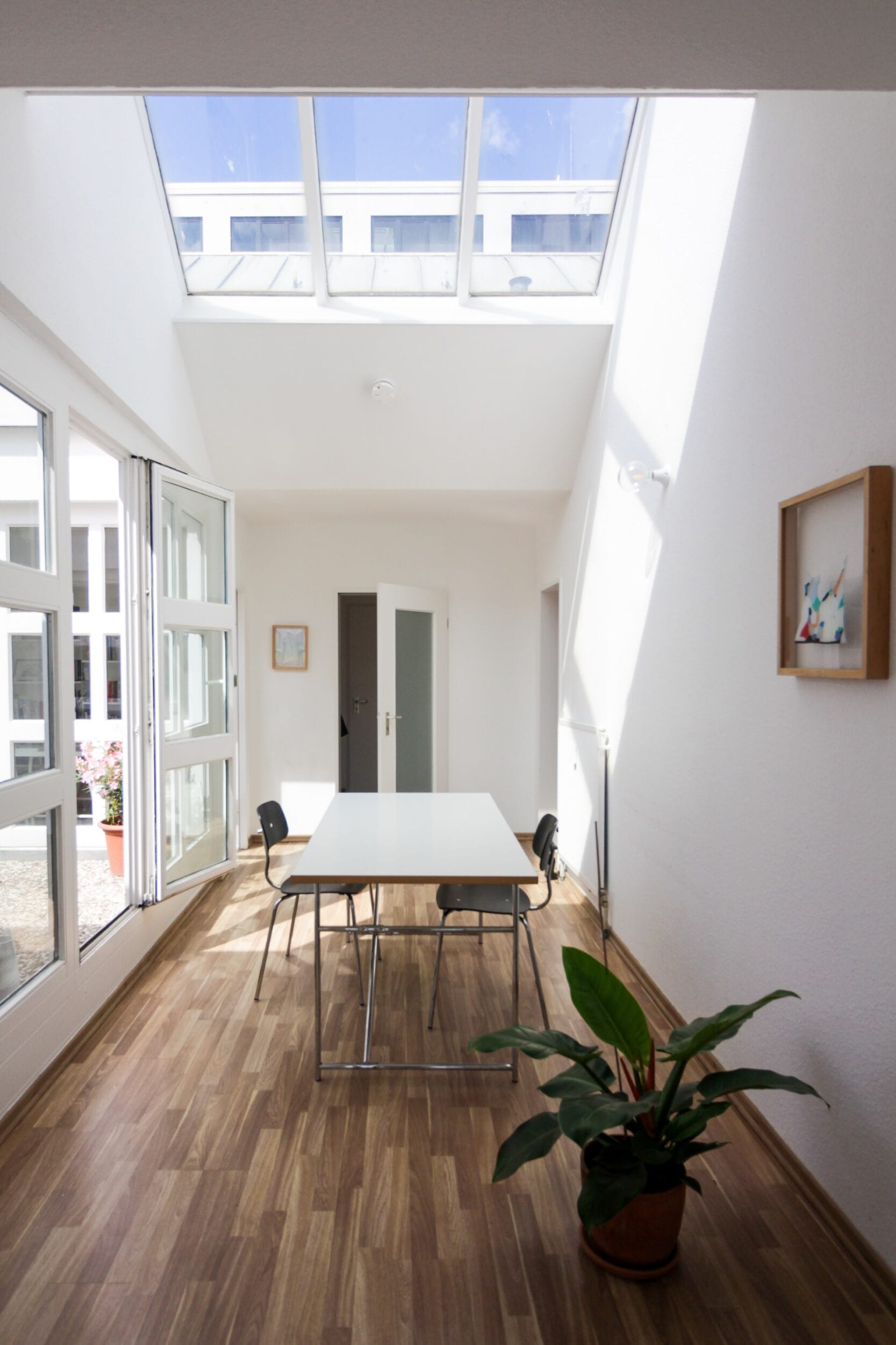 dining room with skylight