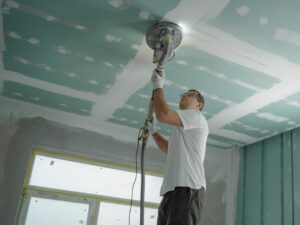man working on the ceiling