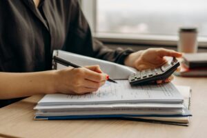 Person with calculator